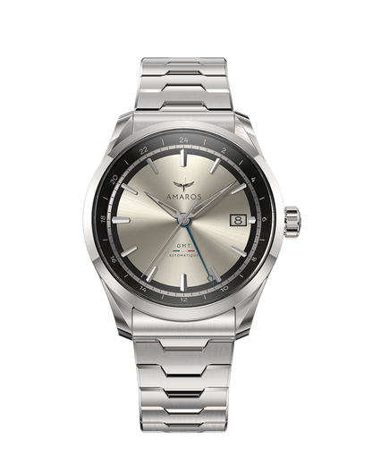 Silver watch with a metallic face on a white background